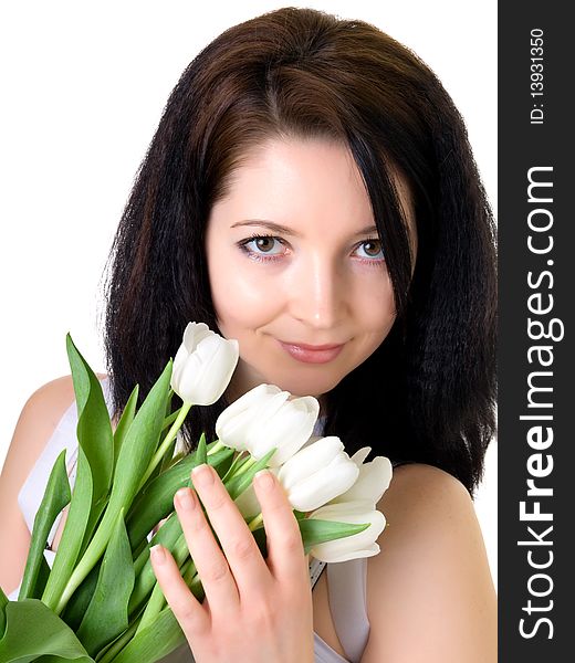 Attractive woman with white tulips