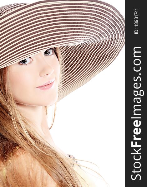 Portrait of a beautiful girl in a summer hat. Isolated over white background. Portrait of a beautiful girl in a summer hat. Isolated over white background.