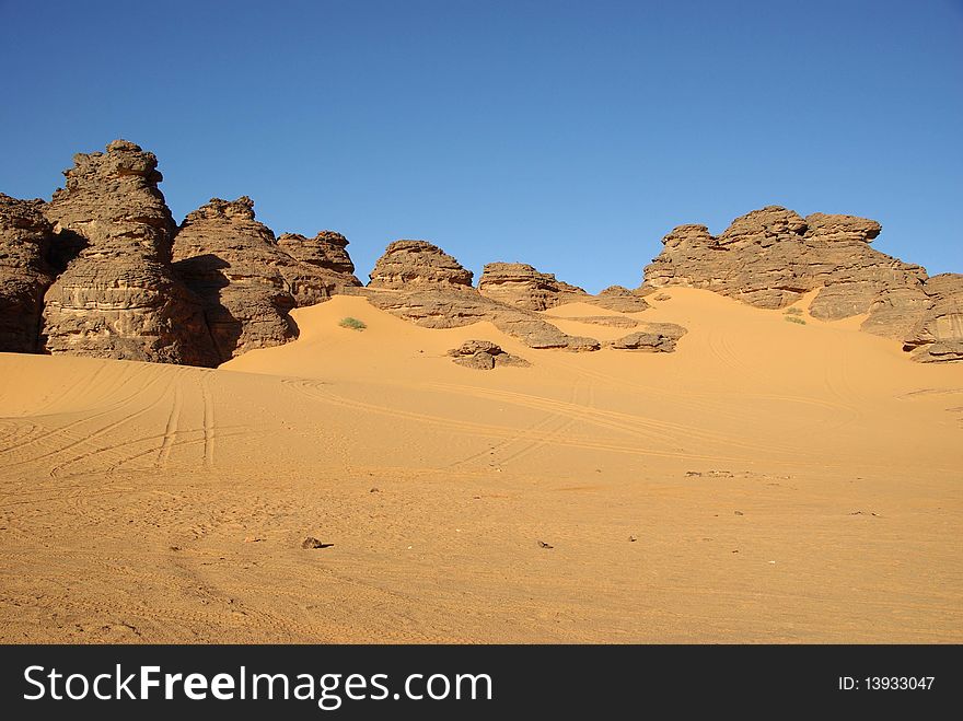 Sandstone peaks in the desert of Libya, in Africa. Sandstone peaks in the desert of Libya, in Africa