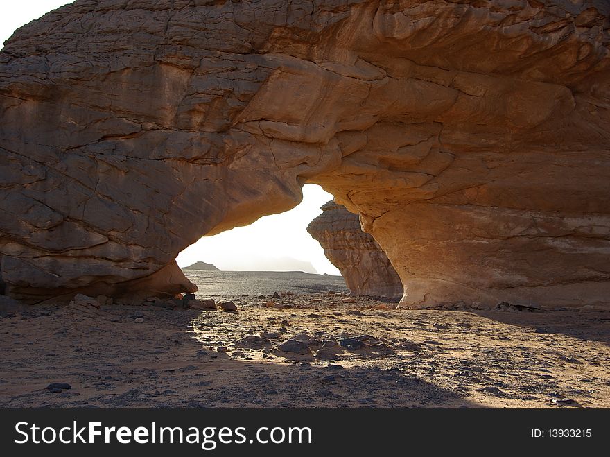 An arch in the desert of Libya, in Africa. An arch in the desert of Libya, in Africa