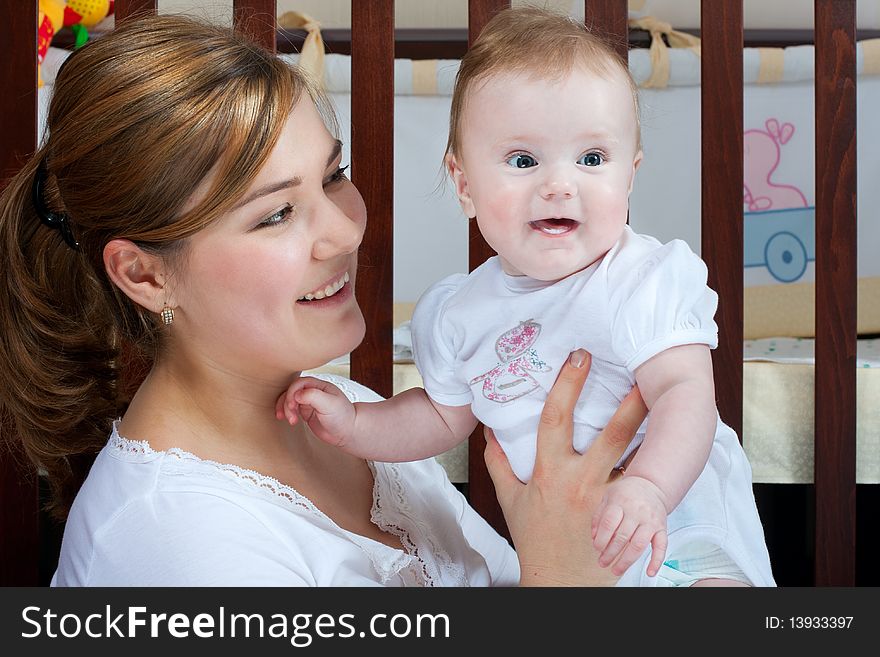 Young beautiful mother with litlle cute baby daughter. Young beautiful mother with litlle cute baby daughter