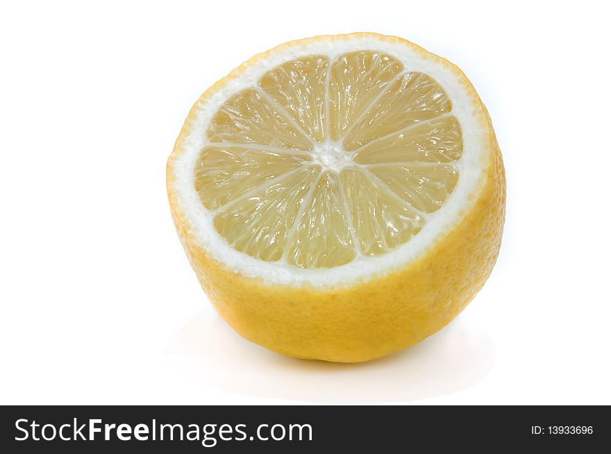 Half of a juicy and ripe lemon. Half of a juicy and ripe lemon