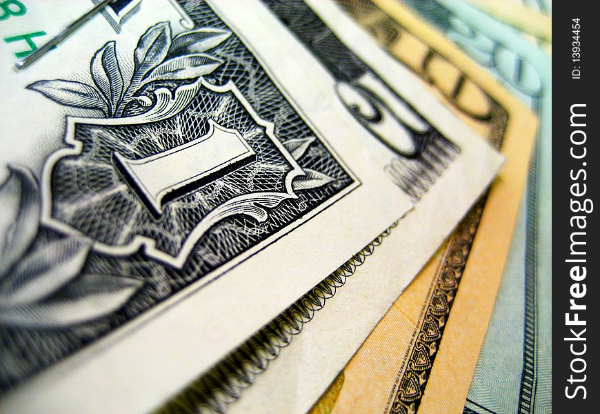 Close up on some dollar bills. Close up on some dollar bills.
