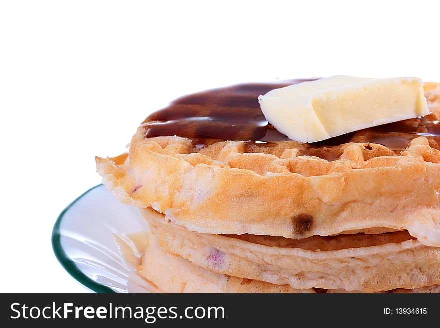 Waffle for a light morning meal on a plate. Waffle for a light morning meal on a plate.