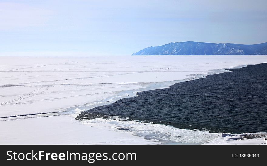 Frozen Lake Baikal. Spring. Day.