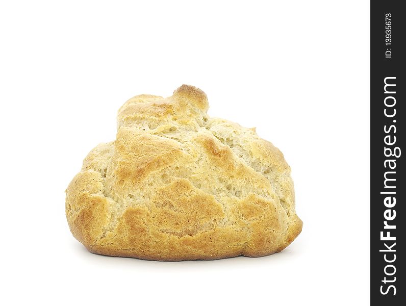 A fresh-baked homemade bun isolated on a white background