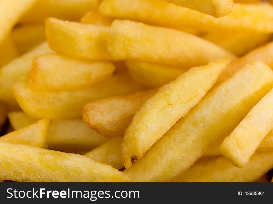 Deep fried,yellow french fries background