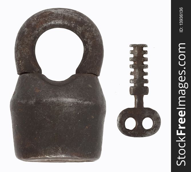 Old cast iron barn padlock with key