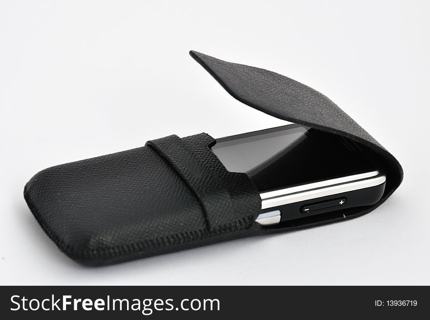 A black mobile phone and bag isolated, means commuination, expedite, portable and electric consumable.