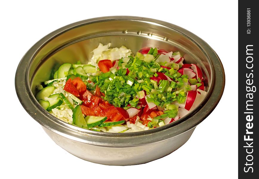 Salad with fresh lettuce leaves, tomato, cucumber, green onion.