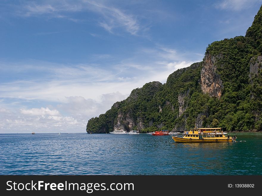 Some divers boats on bay Island Phi Phi Thailand
