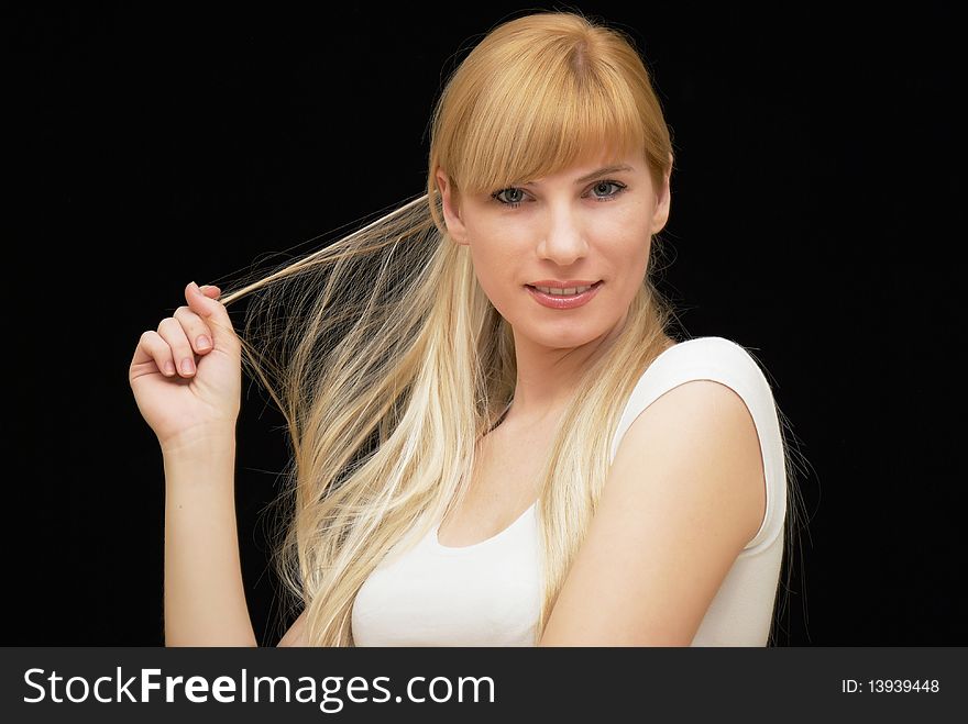 Fashionable woman on black background