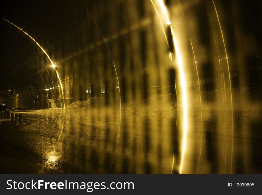 Lightful tunnel mirrored in a business building