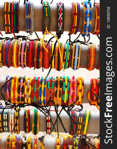 Many colorful bracelets at the souvenir market