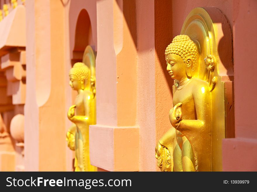 Gold buddha in the temple, in Thailand.