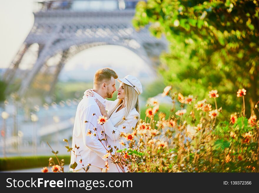 Romantic couple having a date near the Eiffel tower