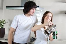 Boy With Smile And Girl With Cup And With Teapot Stock Photos