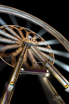 Funfair With Spinning Ferris Wheel Royalty Free Stock Images Funfair With Spinning Ferris Wheel Royalty Free Stock Images