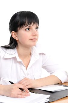 Woman Sits At A Table Royalty Free Stock Photography