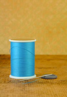 Spool Of Blue Thread With A Needle And Button Stock Image Spool Of Blue Thread With A Needle And Button Stock Image