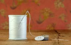 Spool Of Blue Thread With A Needle And Buttons Stock Photos Spool Of Blue Thread With A Needle And Buttons Stock Photos