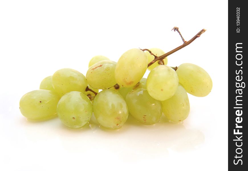 Bunch of green grapes isolated over white background
