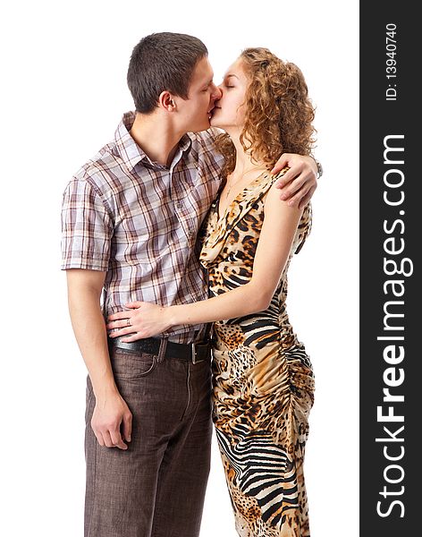 Young couple kissing isolated over white background