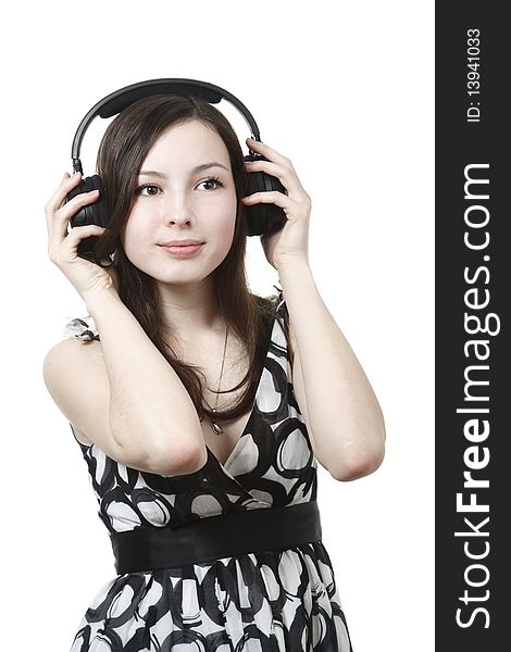 Girl with headphones isolated on white