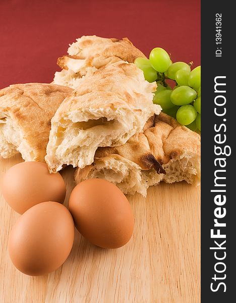 Fresh pita bread with eggs  and grapes. Fresh pita bread with eggs  and grapes