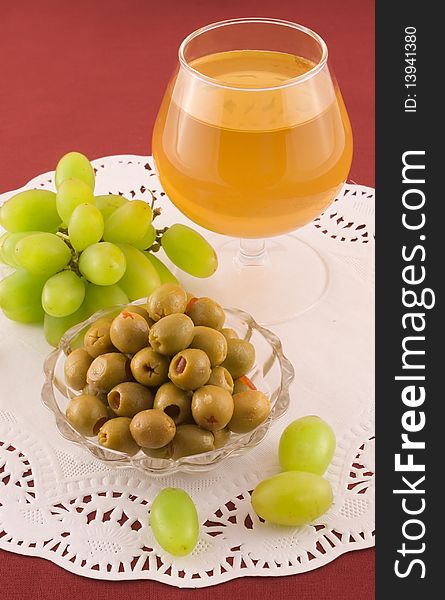 Fresh grapes and cheese with white mold, white wine