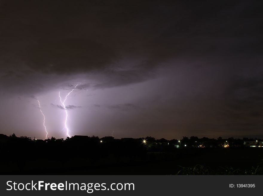 Thunderbolt and heavy storm in the town