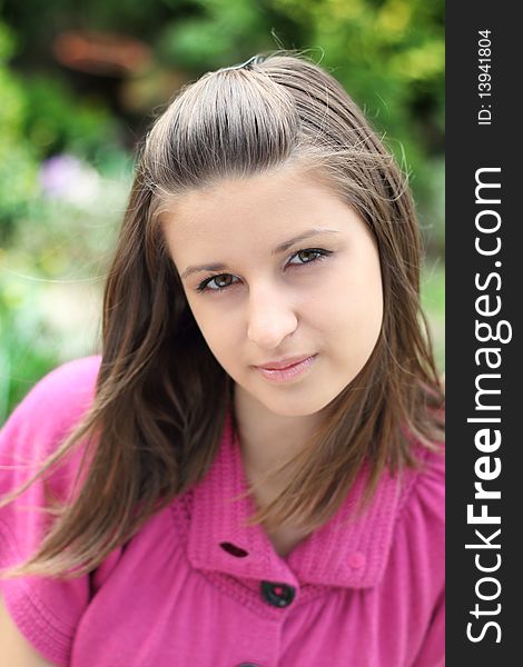 Portrait of the young girl on the flower background. Portrait of the young girl on the flower background