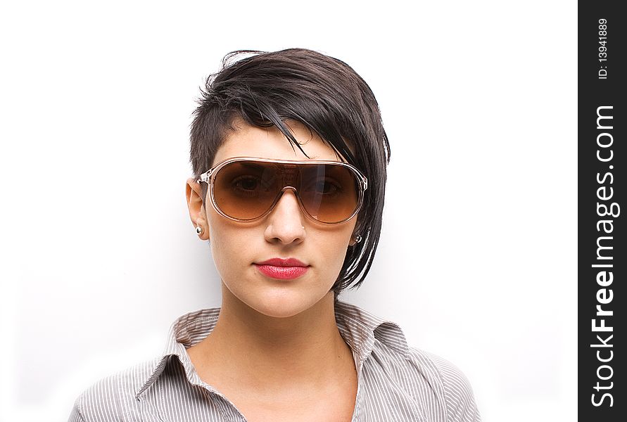 Young girl wearing sunglasses on white background. Young girl wearing sunglasses on white background