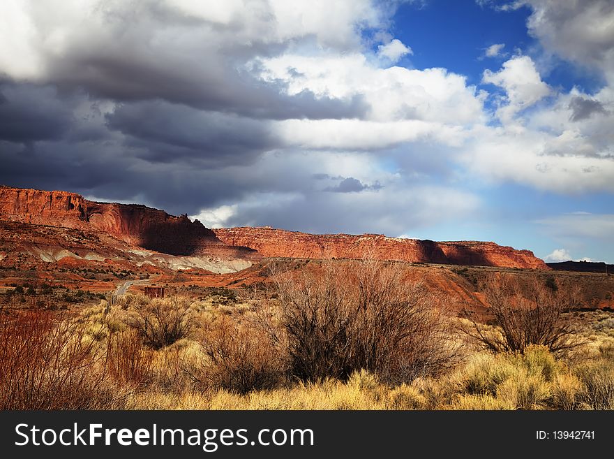 View of the red rock formations in Capitol Reef National Park with blue skyï¿½s and clouds