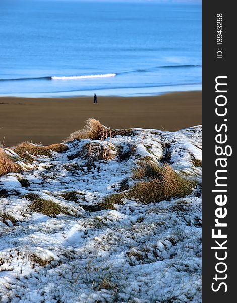 Snowy Winter Walk On A Cold Beach