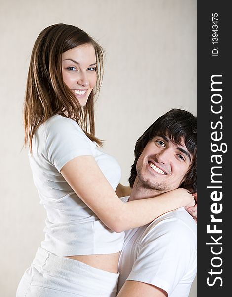 Boy with smile and girl in white t-shirt. Boy with smile and girl in white t-shirt