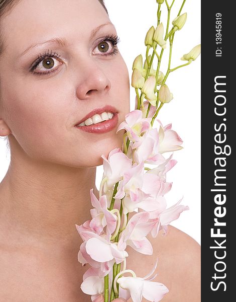 Pretty young woman portrait with orchid. Beautiful nice female face with health skin - white background. Girl on spa with flower.