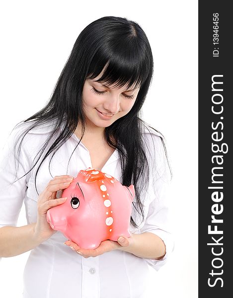 Young beautiful woman standing with piggy bank (money box), isolated on white background. Young beautiful woman standing with piggy bank (money box), isolated on white background