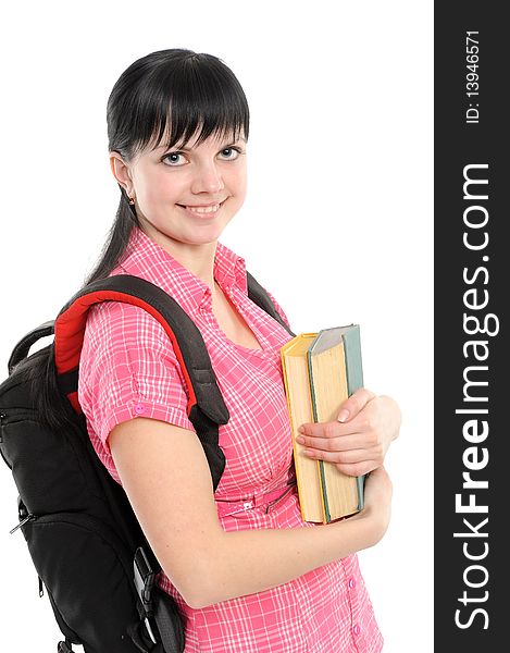Young woman with book and backpack; isolated on a white background