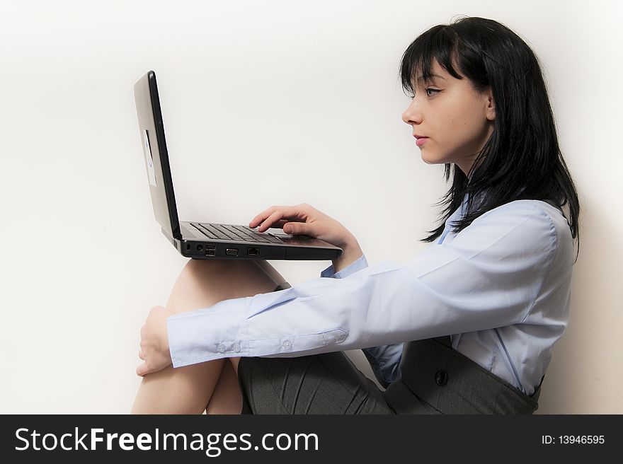 Beautiful Brunette Student Girl with Computer