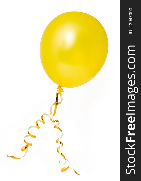 Yellow balloon with ribbons on a white background