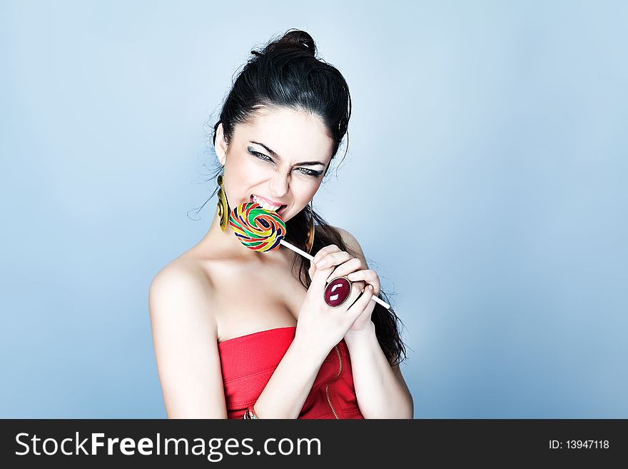 Portrait of a beautiful girl with big lollipop. Portrait of a beautiful girl with big lollipop.