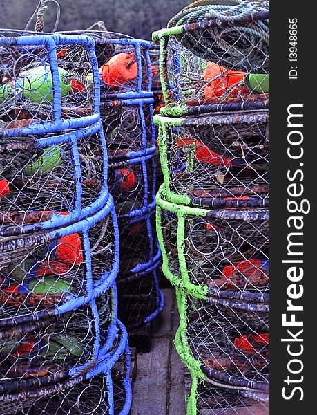 Colorful crab pots waiting to be loaded on the crab boat. Colorful crab pots waiting to be loaded on the crab boat