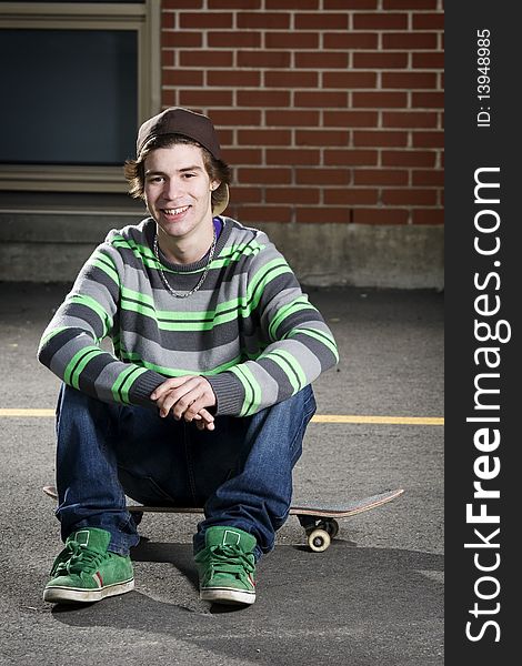 Young Skateboarder Smiling For Camera