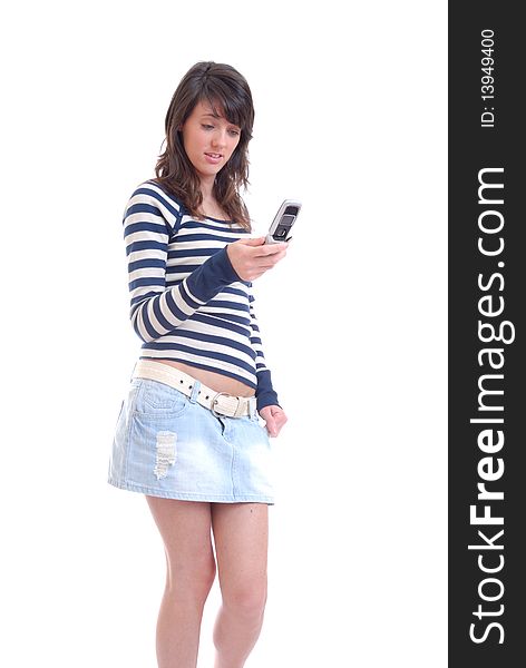 Photograph showing pretty brunette girl on mobile phone. Photograph showing pretty brunette girl on mobile phone
