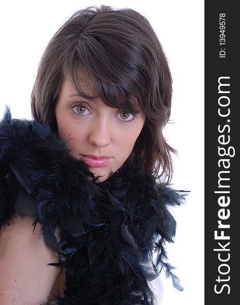 Photograph showing young beautiful brunette with feather boa isolated against white. Photograph showing young beautiful brunette with feather boa isolated against white