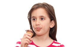 Small Girl Eating An Ice Cream Cone Stock Images Small Girl Eating An Ice Cream Cone Stock Images