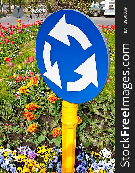Driving sign with flowers in the background. Driving sign with flowers in the background