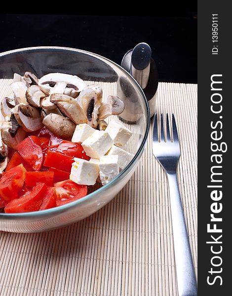 Italian salad with tomatoes, mushrooms and cheese