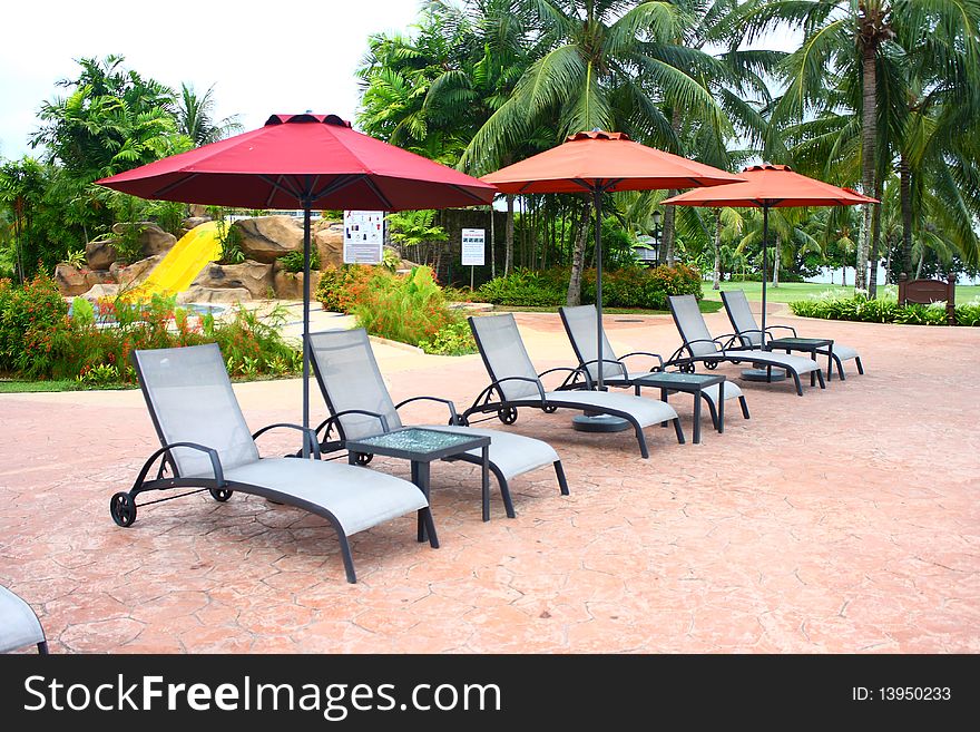 An image showing poolside deckchair for swimmer to relax. An image showing poolside deckchair for swimmer to relax